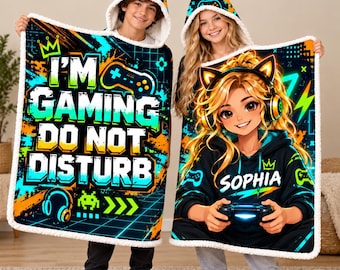 May include: Two hooded blankets with white sherpa lining. One features the text I'M GAMING DO NOT DISTURB with neon blue, green, and orange graphics of a game controller and headphones. The other shows an anime-style character with the name SOPHIA.