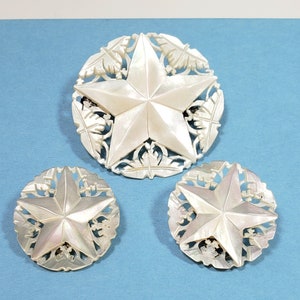 Vintage carved mother of pearl brooch and clip on earrings set - star celestial vintage jewelry