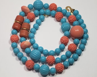 Kenneth Lane beaded necklace with faux lucite coral and turquoise beads some carved as flower very long vintage jewelry