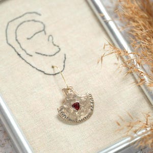 Handmade mapuche style earrings in golden bronze and red stones
