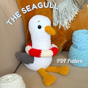 May include: A set of three ceramic mugs with a speckled, matte finish. The mugs are in shades of cream, light brown, and dark brown. Each mug has a simple, minimalist design, perfect for coffee or tea.