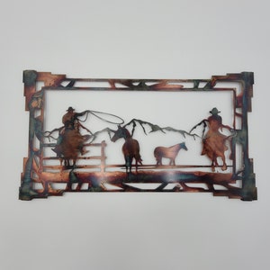 Metal Cowboys Wall Hanging
