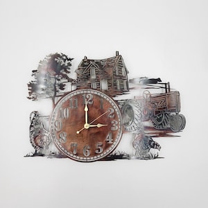 May include: A metal wall clock with a farmhouse scene. The clock features a brown house, a tractor, a tree, and two chickens. The clock face is brown with white numbers and gold hands.