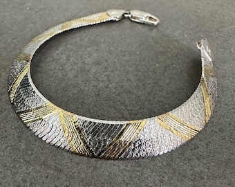 Bracciale vintage Milor Italia in argento sterling e placcato oro a spina di pesce