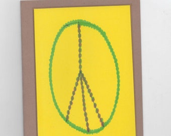 Juego de seis tarjetas con la frase "Paz en la Tierra"