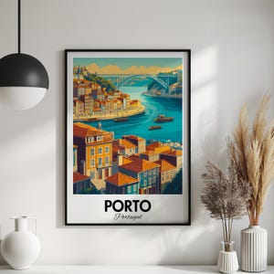 May include: A vintage travel poster featuring a colorful illustration of Porto, Portugal. The poster depicts a cityscape with buildings, a bridge, and a river. The text "PORTO Portugal" is printed at the bottom of the poster.