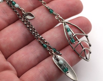 Oxidized Sterling Silver Leaf Dangle Earrings: Asymmetric Blue Glass