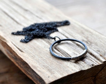 Silver Lining Necklace - Oxidised Sterling Silver, with a Handmade Circle Featuring a Splash of Contrasting Silver Coil.