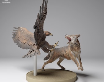 May include: A detailed sculpture depicting a golden eagle attacking a wolf. The eagle is mid-flight with outstretched wings, talons extended. The wolf is in a defensive posture, mouth open. The sculpture is mounted on a circular base.
