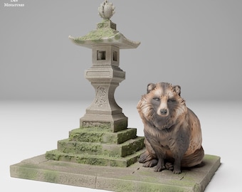 May include: A detailed miniature scene featuring a stone Japanese lantern and a tanuki statue. The lantern is gray with moss accents, and the tanuki has brown and tan fur. The base is also gray with moss.