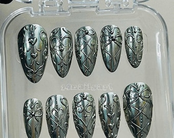 Silver Carved Heart Press On Nails – Handmade Metallic Engraved Bow Gothic Nail Art – Medium Almond Chrome Fake Nails