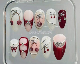 Kirschpresse auf den Nägeln - Rote Schleife Nail Art, Mandelform