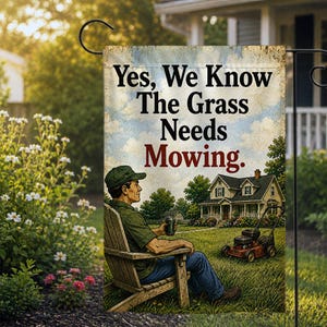 May include: A rectangular garden flag featuring the text Yes, We Know The Grass Needs Mowing. The illustration depicts a person in a green shirt and cap sitting in a wooden chair holding a drink, with a house and a red lawn mower in the background.