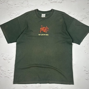 May include: A dark green t-shirt with a red and yellow graphic of a band and the text "Don't give me commas".