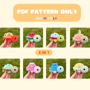 Peut inclure: Huit patrons de tortues amigurumi au crochet. Les tortues sont réalisées avec du fil coloré et présentent différents motifs de fruits, notamment la pastèque, l'orange, la pomme et la fraise. Les patrons sont disponibles en anglais et en français.  MODÈLE PDF UNIQUEMENT. 8 EN 1.