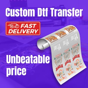 May include: A roll of white transfer paper with various colorful designs printed on it. The designs include phrases like "Jolly Jolly", "Spice Spice Baby", and "Rockin". The text "Custom Dtf Transfer" is displayed in large letters at the top of the image. A red rectangle with the text "FAST DELIVERY" is in the upper left corner.