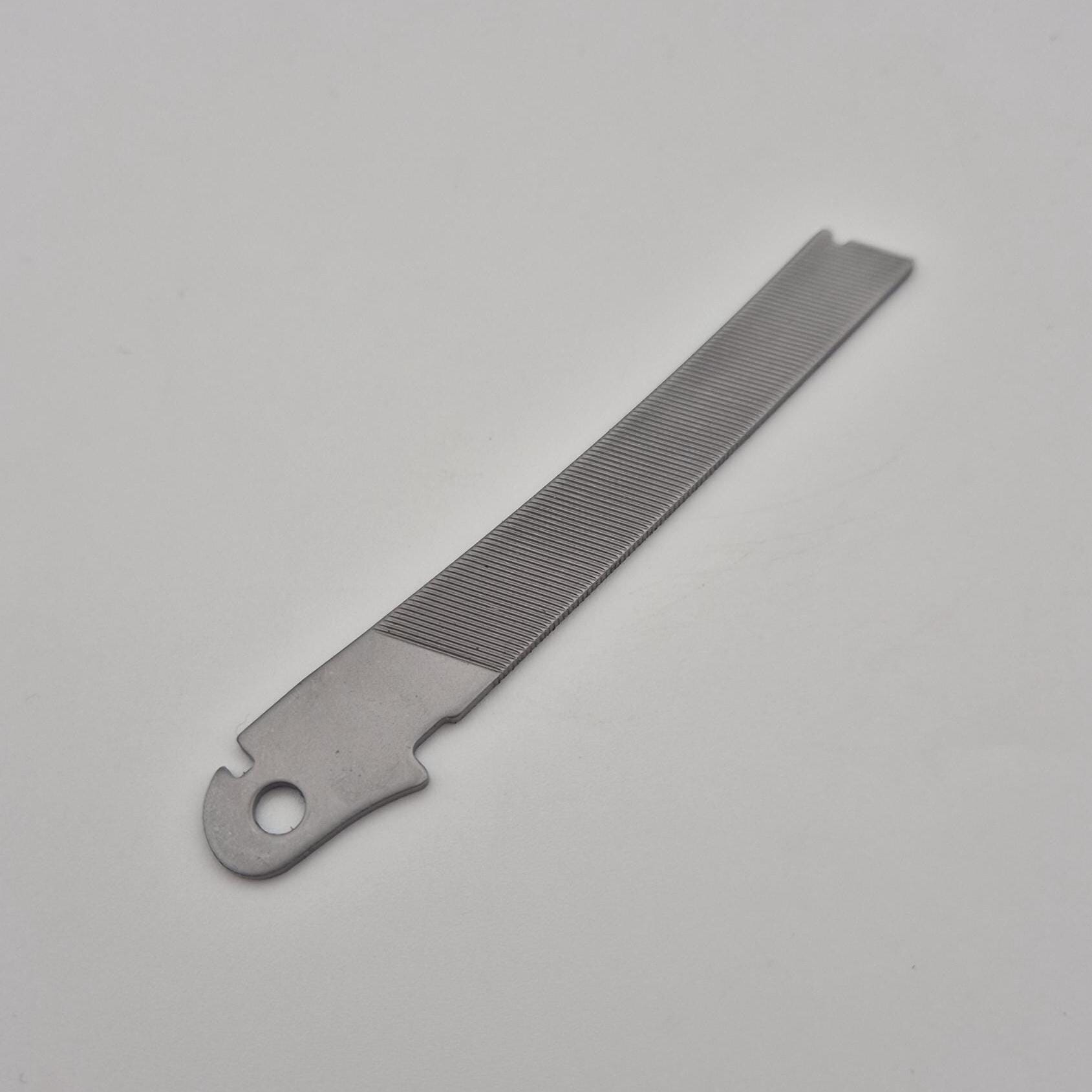 thumbnail image 2 of Leatherman Super Tool 300 Bottom Screw - Replacement Part - Stainless Steel 2 of 2