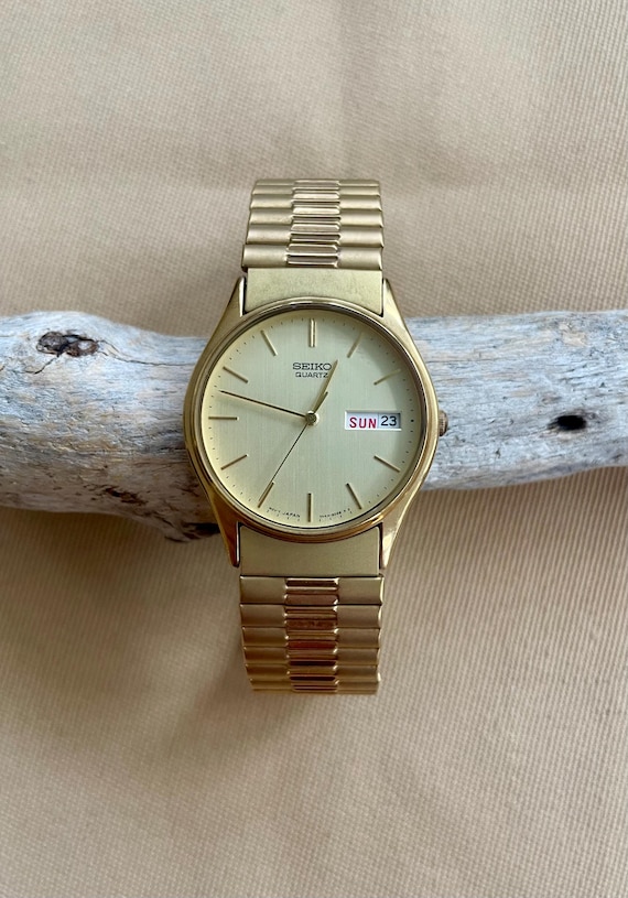 〇Nc左1045 昭和レトロ SEIKO QUARTZ DM303E オレンジ