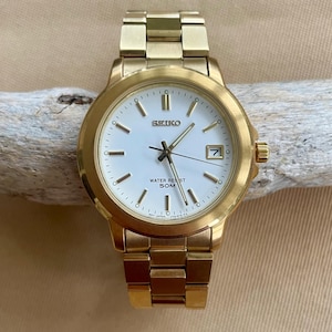 Vintage Seiko Watch • Round Gold Quartz SKT076 • White Dial with Lumibrite & Date Display