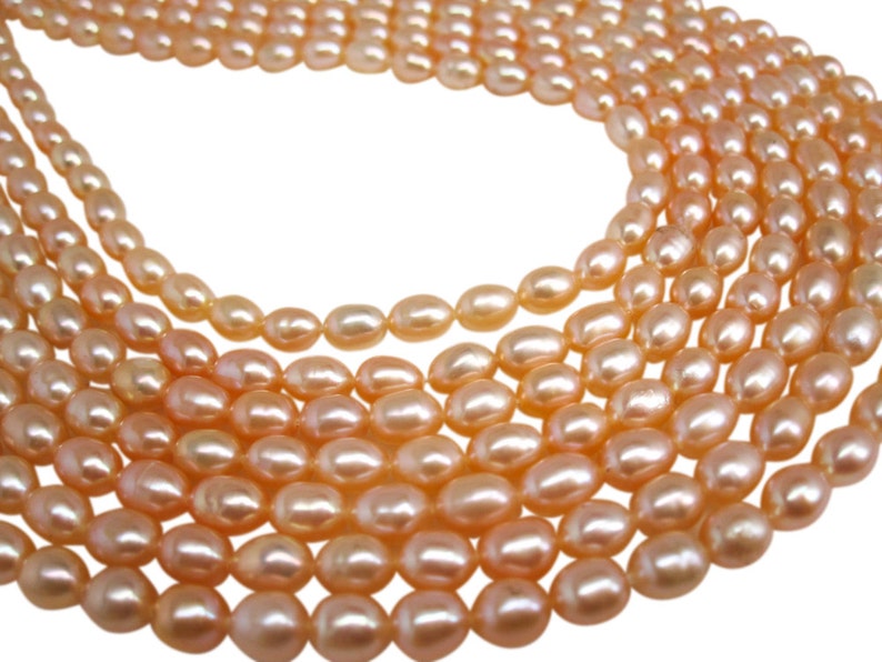 Peach Pearls Peach Color Freshwater Pearls Rice Shape SKU 4728 image 4