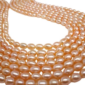 Peach Pearls Peach Color Freshwater Pearls Rice Shape SKU 4728 image 2