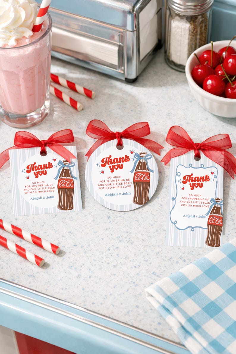 May include: Three gift tags with red bows, featuring a vintage Coca-Cola bottle illustration and the words "Thank You." The tags have the text "So much for showering us and our little bean with so much love" and the names "Abigail & John."