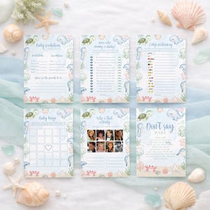 K&ouml;nnte beinhalten: Sechs Babyparty-Spielkarten mit Meeresmotiven. Jede Karte zeigt Illustrationen von Meeresbewohnern und Text wie "Baby Predictions Advice", "Guess Who is Mummy or Daddy?" und "Don't Say Baby".