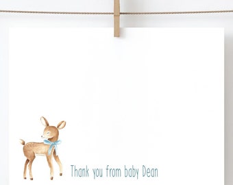 May include: A white card with a brown deer with a blue bow. The text "Thank you from baby Dean" is printed on the card.