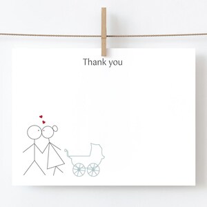 May include: A simple thank you card with a stick figure couple and a baby carriage. The card says "Thank you" at the top.