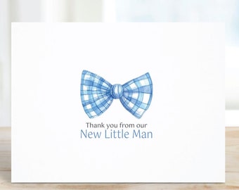 May include: A white card with a blue and white checkered bow tie and the text "Thank you from our New Little Man".