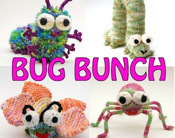 May include: A collection of four knitted bug toys. The toys are a green and purple caterpillar, a green and white caterpillar, a pink and orange butterfly, and a pink and green spider. The toys are all handmade and have big, googly eyes.
