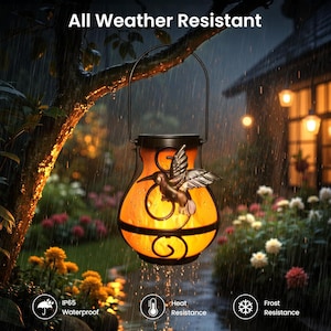 May include: A solar-powered outdoor lantern with a hummingbird design. The lantern has a warm, orange glow and is hanging from a tree branch. The image includes the text "All Weather Resistant", "IP65 Waterproof", "Heat Resistance", and "Frost Resistance".