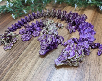 Ready to ship, matching articulated baby and adult orchid dragons in purple and gold silk filament