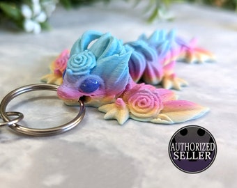 Ready to ship, rainbow pastel rose dragon keychain fidget toy made using articulated 3d printed Cinderwing3d design