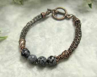 Copper Viking Knit bracelet with snowflake obsidian beads and a toggle clasp