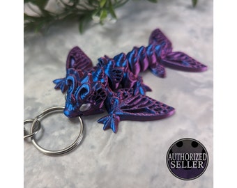 Ready to ship, assorted colours of flexible, articulated, butterfly dragon keychain fidget toy