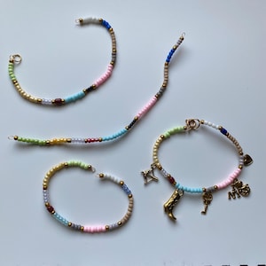 Handmade Taylor Eras Beaded Friendship Bracelets | Choose from 300+ colors & charms | Personalized for friends, concert, birthday, trading