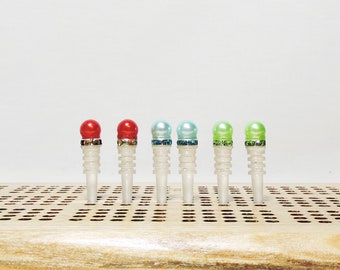 Balancing On Ice - Clear Resin Pegs - Red, Lt Blue, Lt Green colorless pin