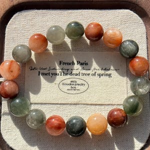 11mm Natural Multicolor Rabbit Hair Rutilated Quartz Beaded Bracelet 11咪天然老矿彩兔毛圆珠手串