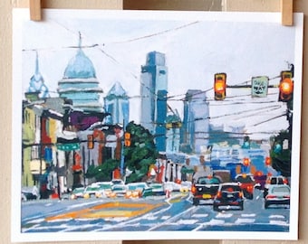 May include: A colorful painting of a city street scene with tall buildings, traffic lights, and cars. The buildings are painted in shades of blue, green, and brown. The traffic lights are red, yellow, and green. The cars are painted in shades of red, blue, and gray.