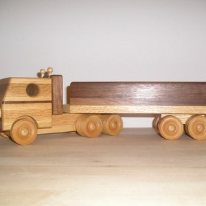Wooden 18 Wheeler Transport with a HANDRUBBED beeswax finish.