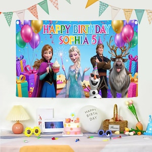 May include: A colorful birthday banner featuring characters from the movie Frozen, with the text "HAPPY BIRTHDAY SOPHIA 5". The banner includes balloons, gifts, and a festive design, perfect for a child's birthday party.