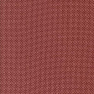 May include: Close-up of a fabric with a repeating pattern of small squares in shades of red and maroon. The texture is dense and uniform, creating a visually consistent surface. The overall effect is a solid, textured background.