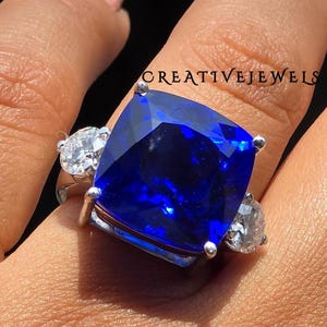 Gorgeous Royal Blue Sapphire Cushion Cut Anniversary Ring With Side Round Cut Stone , Trilogy Basket Setting Gemstone Gift Ring For Her