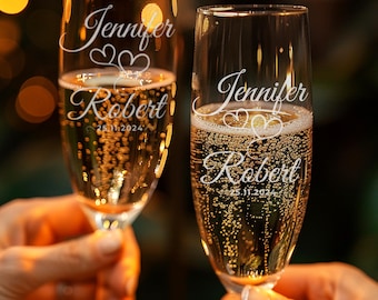 May include: Two champagne flutes with the names Jennifer and Robert etched on them, along with the date 25.11.2024.