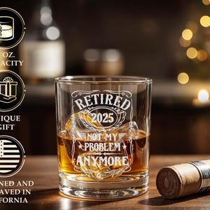 May include: A clear glass tumbler with the text "RETIRED 2025 NOT MY PROBLEM ANYMORE" etched on the front. The glass is filled with amber liquid and ice. The glass has an 11 oz capacity. The design is engraved in California.