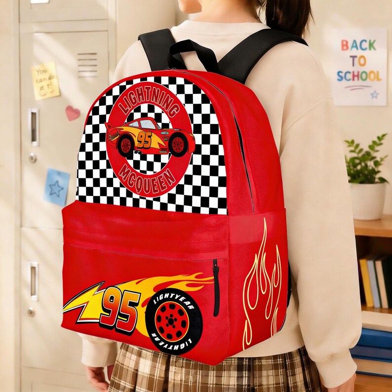 May include: Red backpack featuring Lightning McQueen from the Cars movie. The backpack has a large front pocket and a top handle. The design includes a checkered flag pattern, the number 95, and the words "Lightning McQueen".