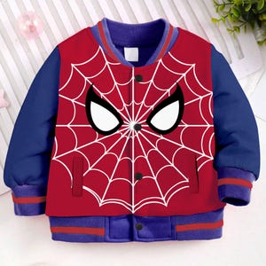 May include: Red and blue bomber jacket with a white spider web and eye design. The jacket has a button closure and ribbed cuffs and waistband.