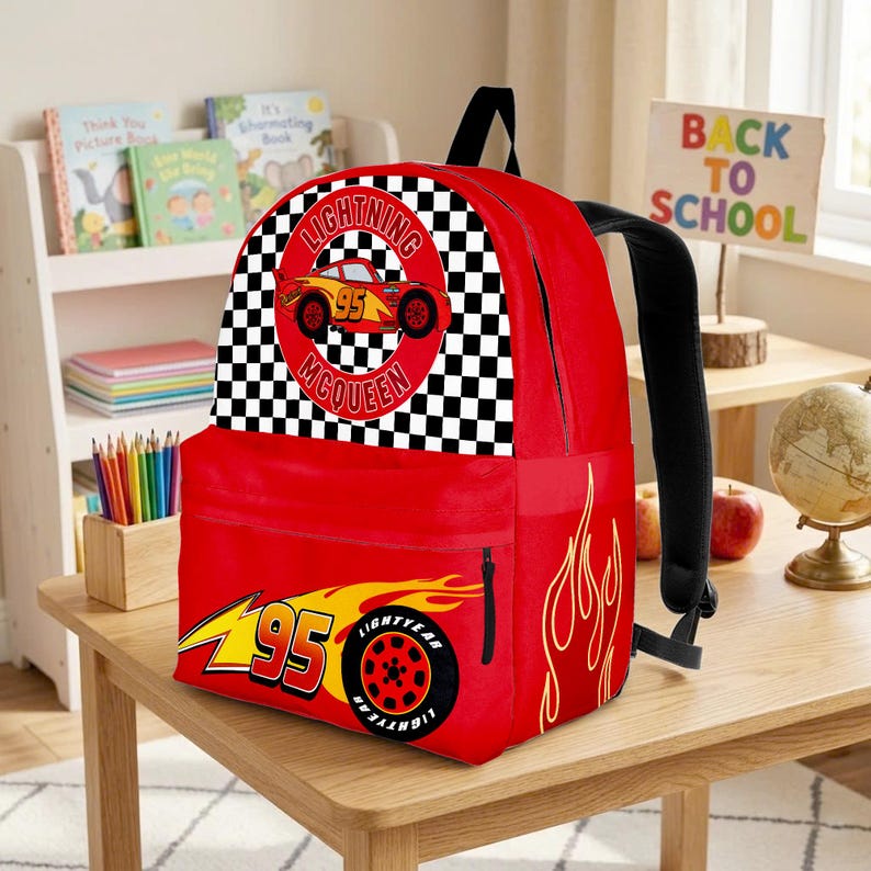 May include: Red Lightning McQueen backpack with black straps. Features a large graphic of Lightning McQueen with the number 95 and a checkered flag design. Includes a side pocket and flame graphics.