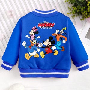 May include: Blue and white striped long-sleeved jacket with a blue background and a graphic of Mickey Mouse and his friends. The text "Disney Mickey Friends" is printed on the jacket.